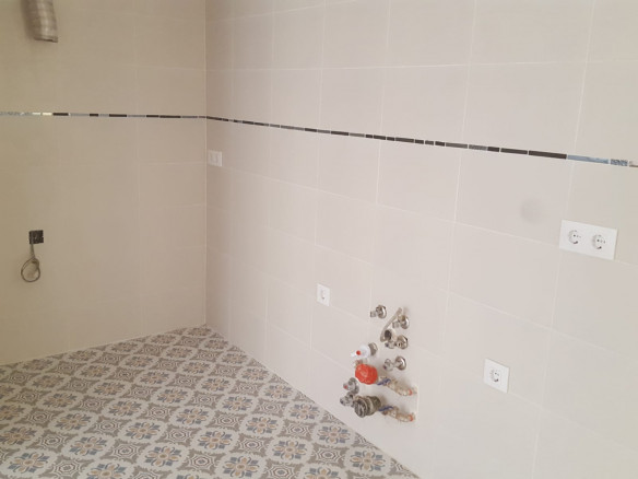 Reforma de un estudio y de un piso C/ Santísima Trinidad