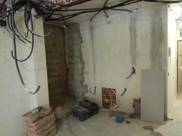 Reforma de un estudio y de un piso C/ Santísima Trinidad